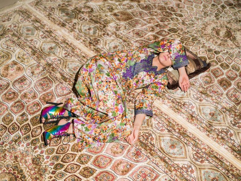 Farah Al Qasimi, M Napping on Carpet, 2016, Archival Inkjet Print, 91 x 71 cm. Art Jameel Collection. Image courtesy of the artist and The Third Line. 